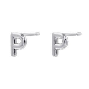 Detailed view of silver letter P stud earrings with a high-polished metallic finish