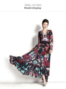 Detailed model shot of flowy floral maxi dress with deep V-neck and lantern sleeves