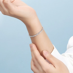Classic S925 sterling silver tennis chain bracelet with shimmering cubic zirconia on wrist