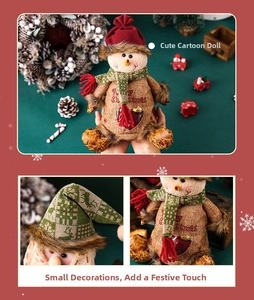 Detail view of rustic snowman gift bag made of burlap with Merry Christmas text