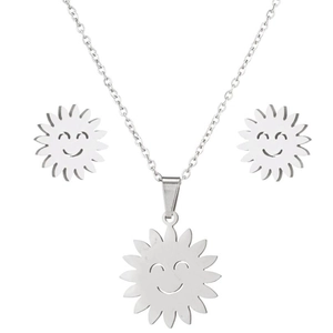 Close-up of silver stainless steel jewelry set with smiling sun pendant and stud earrings