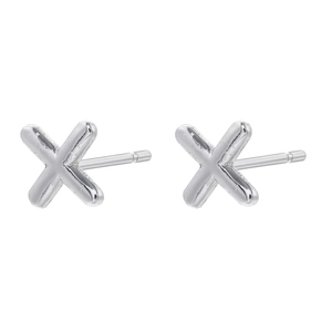 Detailed view of silver X-shaped initial stud earrings with a smooth polished finish