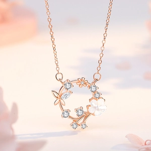 S925 silver necklace with rose gold flower wreath pendant and shell flower detail