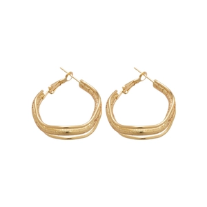 Irregular textured gold hoop earrings with intertwined double ring minimalist design
