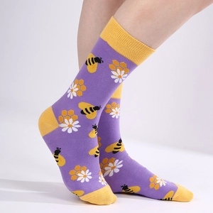 Mid-calf cotton socks in purple and yellow with honeybee and floral knit patterns