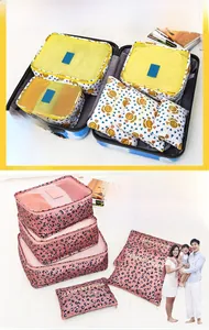 Detailed set of floral and leopard travel luggage organizers in various pouch sizes