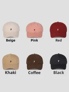 Detailed view of six cotton baseball caps in various colors with number 7 embroidery
