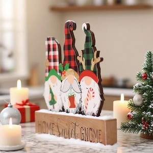 Christmas wooden gnome tabletop decor featuring red plaid hats and HOME Sweet GNOME text