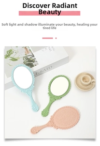 Detailed close-up of retro floral embossed handheld mirrors in pastel blue, green and pink