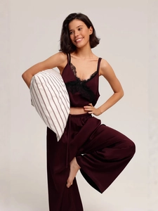 Burgundy silk pajama set for women with black lace trim and matching pants