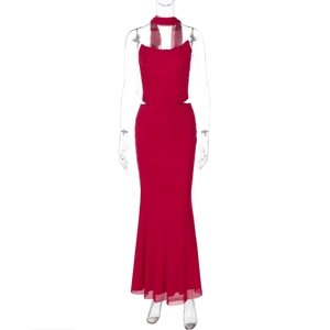 Detail of red two-piece mesh dress set featuring a halter top and ruched fishtail skirt