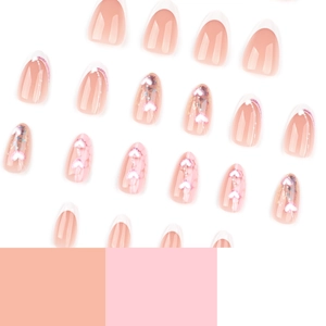 Minimalist white French press-on nails with 3D heart patterns and glitter sequins