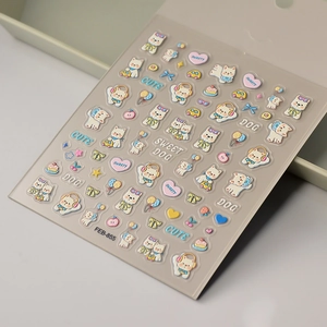 Close-up of 5D embossed dog nail stickers with cute balloon and cake patterns