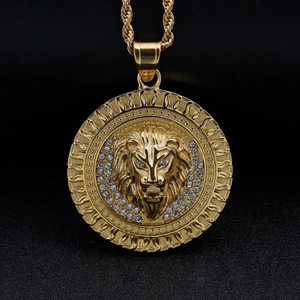 Hip hop gold lion head pendant necklace with rhinestones on dark textured background