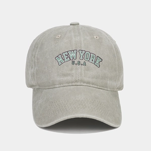 Detail view of vintage washed cotton baseball cap with New York USA embroidery