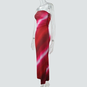 Detail of red and white gradient tie-dye strapless maxi dress with side ruching and slit