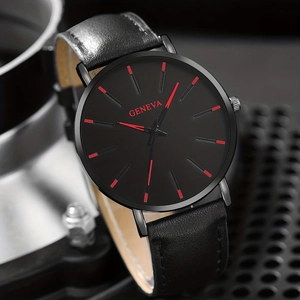 Detail view of ultra-thin black Geneva quartz watch with red hour markers and leather strap