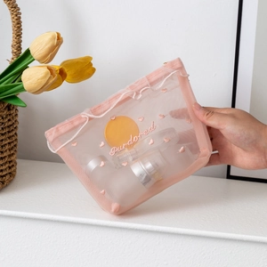 Pink heart mesh cosmetic bag with gold zipper for transparent makeup storage