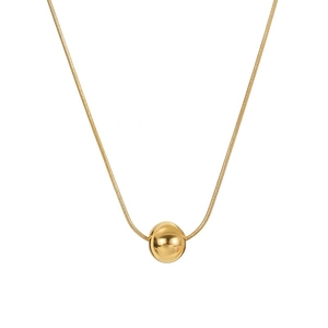 Minimalist gold snake chain necklace featuring a polished round bead pendant