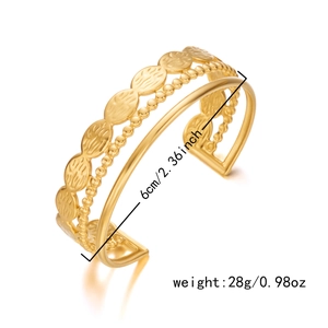 Three-layer gold stainless steel cuff bracelet with textured patterns and 6cm diameter