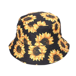 Detail showing high-density stitching on the brim of a black sunflower pattern bucket hat