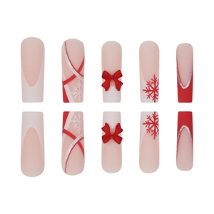 Faux ongles de Noël dégradés avec flocons, nœuds rouges 3D et paillettes argentées