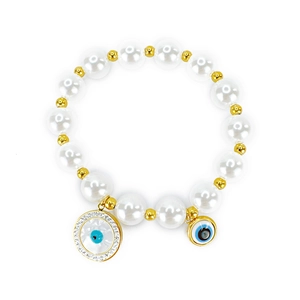Beaded bracelet featuring white pearls, gold accents, and a blue evil eye lucky charm