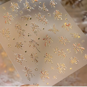 Macro shot of French gradient firework nail stickers with gold and pink butterfly details