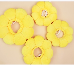 Detailed size comparison of yellow sunflower pet recovery collars in four various sizes