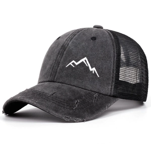 Distressed charcoal gray trucker hat with white mountain embroidery and mesh back