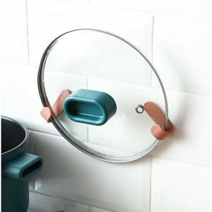 Minimalist J-shaped wall hooks for kitchen storage with dark green and red matte finish