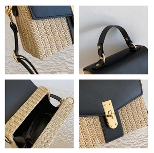 Detailansicht der gewebten Strohtasche mit schwarzem Kunstleder und Goldschnalle