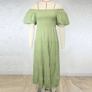 Front view of summer green off-shoulder tiered maxi dress with ruched bust detail