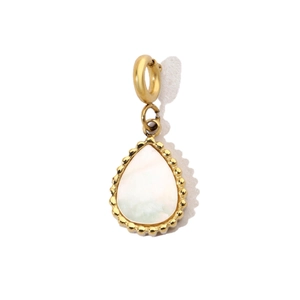 Macro shot of gold-plated teardrop pendant featuring white mother of pearl with beaded edge