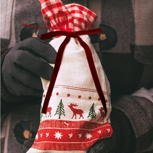 Christmas cotton linen gift bag with reindeer patterns and dark red velvet ribbon bow