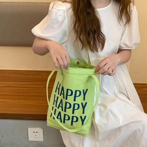 Japanese style green canvas tote bag with Happy lettering print for women