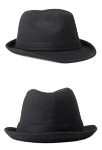 Close-up of black wool felt fedora with ribbon trim and wide brim in British style