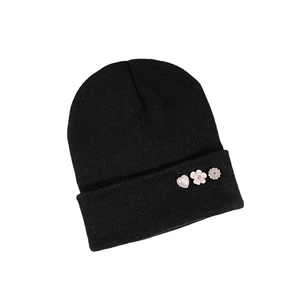 Classic black knitted beanie for women featuring decorative heart and floral embellishments