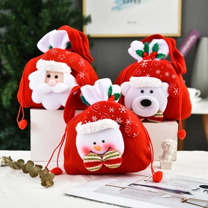 Three festive Christmas candy bags with Santa, Snowman, and Polar Bear 3D plush figures