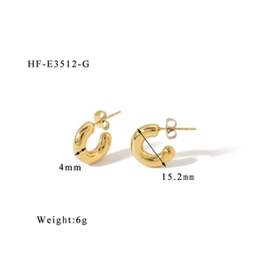 Detail view of 15.2mm gold C-shaped earrings showing 4mm thickness and 6g weight specs