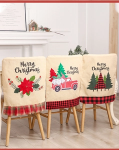 Three Christmas burlap chair covers with Merry Christmas print and checkered ruffles