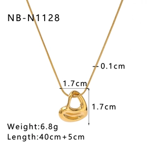 Detail view of 18k gold plated stainless steel hollow heart pendant with dimension specs