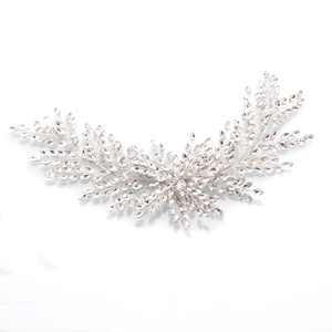 Elegant silver bridal headband with sparkling leaf-shaped crystals on a white background