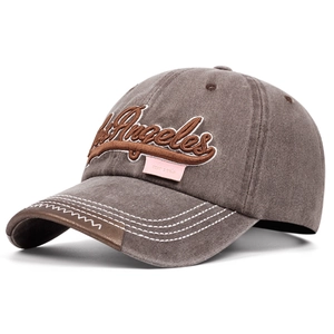 Detail of washed cotton baseball cap with Los Angeles embroidery and contrast stitching