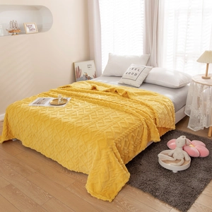 Solid yellow 3D textured flannel blanket with geometric jacquard pattern for cozy bedding