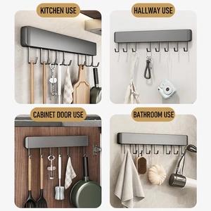 Wall-mounted dark grey kitchen hooks rack for spatulas, towels and diverse organizers