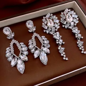 Silver hollow teardrop crystal dangle earrings for women in elegant jewelry box