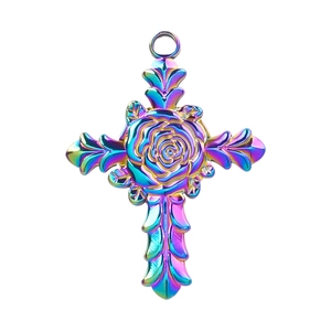 Detailed macro view of a 304 stainless steel rainbow cross pendant with rose engraving