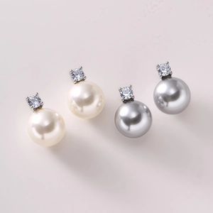 Elegant S925 silver studs with natural freshwater pearls and sparkling zircons