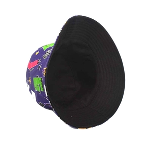 Detail of purple bucket hat with green monster prints and black inner lining
